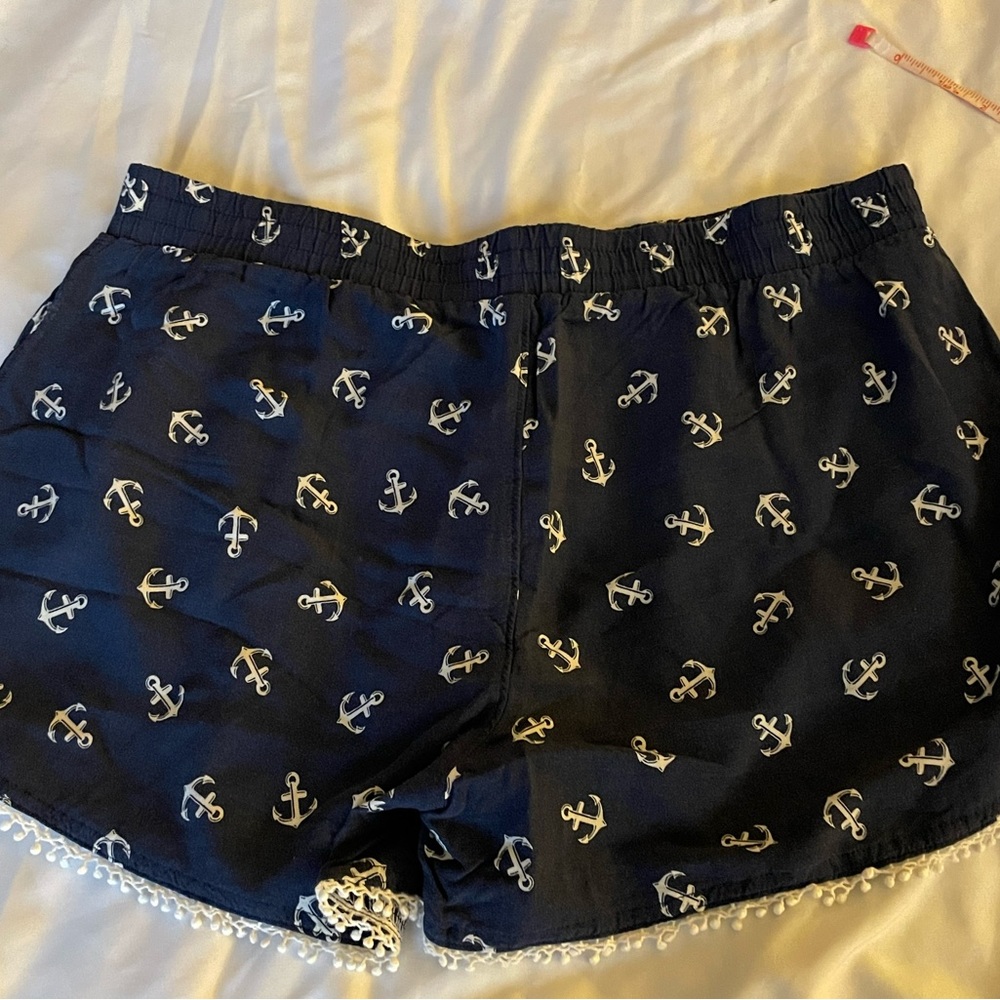 Navy blue shorts with white anchors